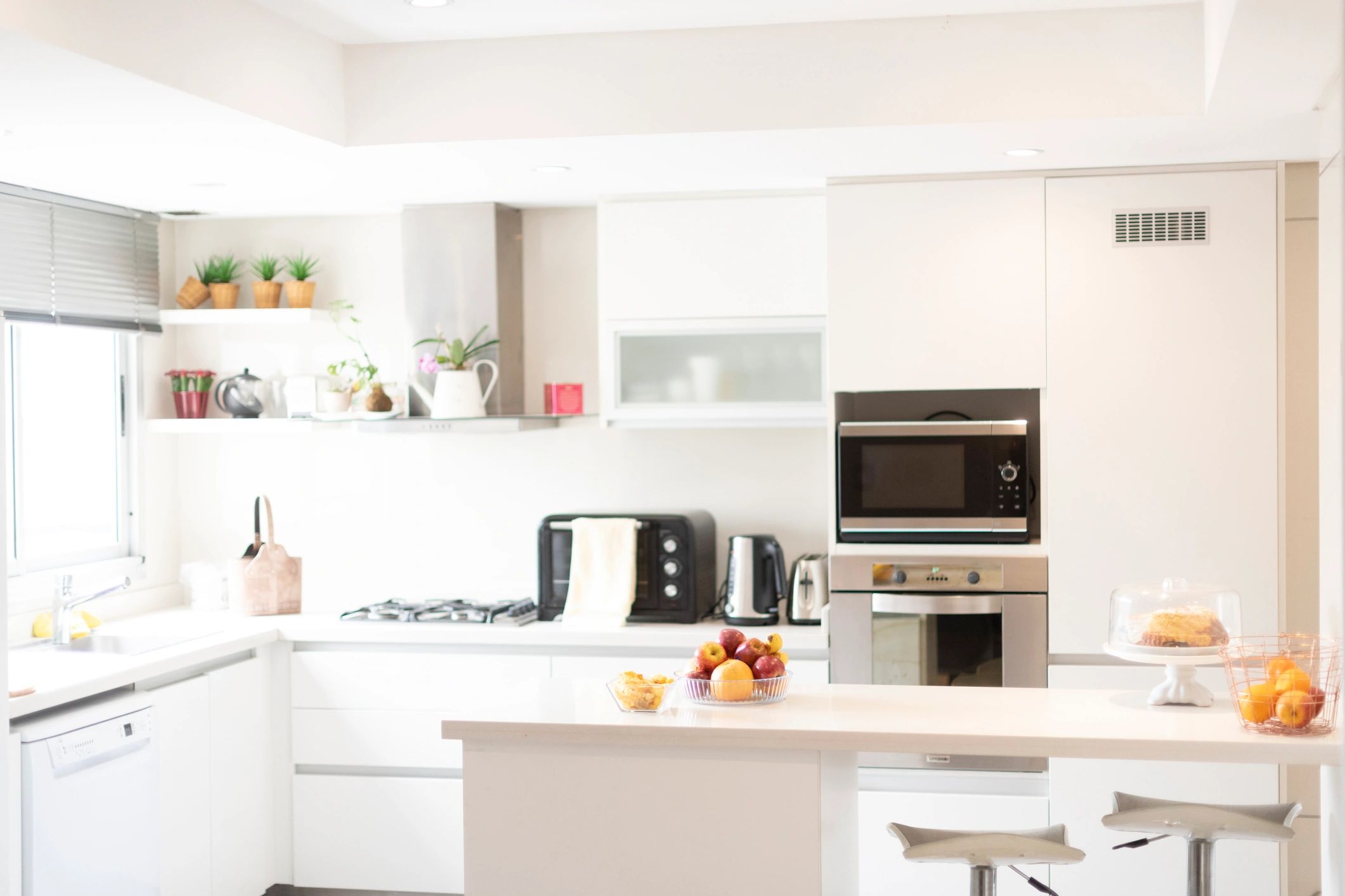 Sunlit kitchen counter arranged for everyday use